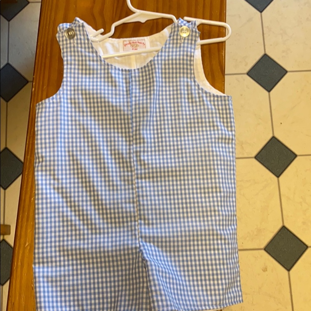 Blue and white checkered jumper